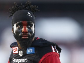 Calgary Stampeders safety Josh Bell is the team's new DB coach.
