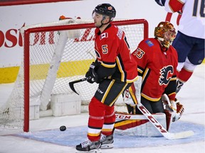 Calgary Flames goaltender David Rittich and Mark Giordano show their disappointment as the Florida Panthers score during NHL action in Calgary on Saturday February 17, 2018. Gavin Young/Postmedia