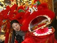 Tina Mao, Manager of the Calgary Chinese Cultural Centre is busy getting ready for this weekends Chinese New Year, Calgary's biggest Chinese cultural celebration and will feature traditional performances and a New Year market on Thursday February 15, 2018. Darren Makowichuk/Postmedia