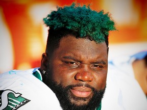 Saskatchewan Roughriders Derek Dennis against the Calgary Stampeders during CFL football on Saturday, July 22, 2017. Al Charest/Postmedia