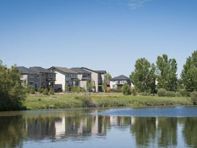 Courtesy Anthem United 
Homes near a water feature in Drake Landing in Okotoks.
