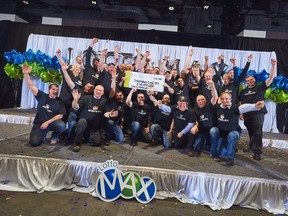 A group of 31 co-workers celebrate as they're handing a cheque for $60 million on Feb. 28, 2018 in St. John's, N.L.
