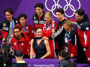 Canada's Kaetlyn Osmond waits for her results during the team figure skating event on Feb. 11.