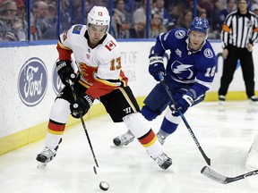 Flames Johnny Gaudreau is chased by Tampa Bay Lightning Ondrej Palat on Jan. 11, 2018, when the teams last met in Tampa, Fla.