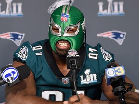 Fletcher Cox of the Philadelphia Eagles wears a mask as he speaks to the media during Super Bowl LII availability on January 31, 2018 at Mall of America in Bloomington, Minnesota. (Hannah Foslien/Getty Images)