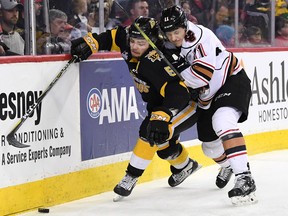 The host Calgary Hitmen fight for their playoff survival in a loss to the visiting Brandon Wheat Kings at the Saddledome on Sunday, Feb. 25.