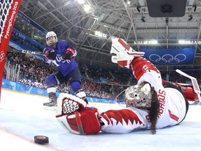 U.S. forward Jocelyne Lamoureux scores the gold medal-winning shootout goalie on Canadian goalie Shannon Szabados at the Pyeongchang Olympics on Feb. 22.