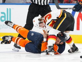 Oilers tough-guy Zack Kassian fights young Flames ruffian Ryan Lomberg at Rogers Place on Jan. 25. Photo by Codie McLachlan/Getty Images.