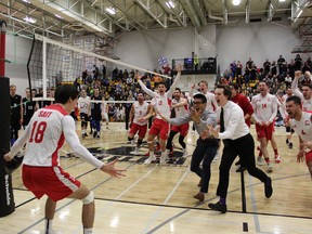 SAIT's Juan Becerra (left) is about to be mobbed by teammates after being named player of the game in their ACAC championship final victory.