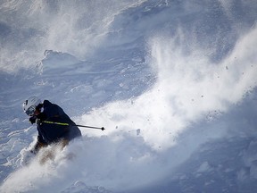 Skier enjoys the superb conditions on a run called Brown Shirt at Lake Louise. The National Park resort located west of Banff in the Canadian Rockies is one of North America's biggest resorts offering 4200 skiable acres with 145 named runs.