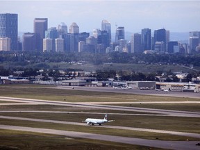 The view of downtown Calgary from the NAV Canada traffic control tower at the Calgary International Airport, in Calgary on July 3, 2013.