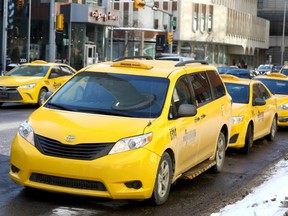 Taxi's wait in downtown Calgary as Ubers first year of operation in the city, ride-share trips totalled around 2.3 million  about a third of the number of taxi trips taken in the city in 2017 on Wednesday February 21, 2018. Darren Makowichuk/Postmedia