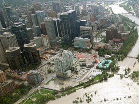 Ted Rhodes Calgary Herald CALGARY, AB; JUNE 21, 2013  --  The Flood of 2013 and the Bow River surround Prince's Island Park and downtown Calgary on Friday June 21, 2013. (Ted Rhodes/Calgary Herald) For City story by . Trax #
