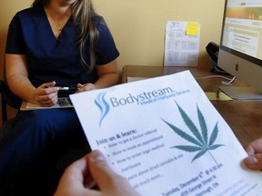 In this file photo, a clinic supervisor at Bodystream Medical Marijuana Services talks to a reporter on Tuesday November 15, 2016 in Peterborough, Ont.