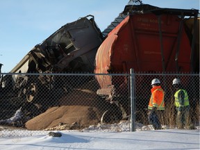 Eight train cars full of grain en route to Vancouver derailed near Ellerslie Road and Parsons Road in Edmonton, Alta., around 2:30 p.m. on Friday, Feb. 16, 2018.