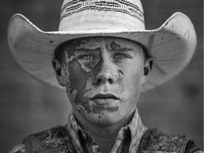 Hennel's nominated photo in the portrait category: Novice steer rider Kade McDonald of Melville, Saskatchewan is seen here after his ride at the Calgary Stampede on Tuesday July 11, 2017. Leah Hennel/Postmedia