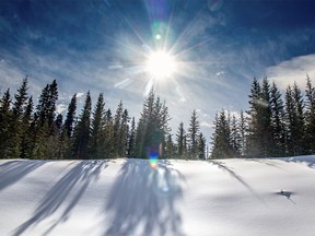 The nearly-spring sun shines on the snow in the Smuts Creek valley on Wednesday March 14, 2018. Mike Drew/Postmedia