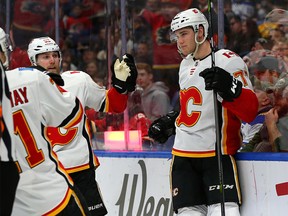 BUFFALO, NY - MARCH 7: Mark Jankowski #77 of the Calgary Flames celebrates his goal against the Buffalo Sabres with Sam Bennett #93  during the first period at KeyBank Center on March 7, 2018 in Buffalo, New York. (Photo by Kevin Hoffman/Getty Images)