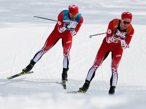 PYEONGCHANG-GUN, SOUTH KOREA - MARCH 12:  Brian McKeever  and his guide Graham Nishikawa of Canada compete in the Men's Cross Country 20km Free, Visually Impaired event at Alpensia Biathlon Centre during day two of the PyeongChang 2018 Paralympic Games on March 12, 2018 in Pyeongchang-gun, South Korea. (Photo by Buda Mendes/Getty Images)