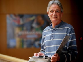Jim Besse, a Calgary retiree, is suing the Calgary police and RCMP after he was required to provide his fingerprints to continue coaching youth hockey in 2012 because his birthdate matched that of a pardoned registered sex offender. He's arguing that the requirement violated his constitutional rights in a case set to come before a Calgary judge in April. Al Charest/Postmedia