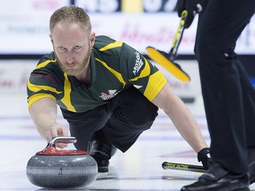 Northern Ontario skip Brad Jacobs delivers a rock against Nova Scotia in the eight-team championship round at the Tim Hortons Brier at the Brandt Centre in Regina on Thursday, March 8, 2018. (THE CANADIAN PRESS/Andrew Vaughan)