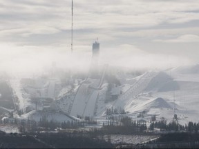 Calgary Sun - 02/16/10 - Fog blankets the ski jumps at WinSport Canada Olympic park early Tuesday morning.  BRANDON MCKAY/SPECIAL TO QMI AGENCY