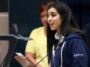 Puncham Judge, VP External with the University of Calgary's student union, speaks in favour of streamlining approval for secondary suites during a public hearing in Calgary City Council Monday March 12, 2018,