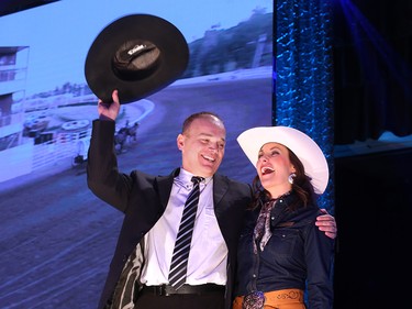 Chuckwagon driver Chad Harden salutes the crowd at the GMC Rangeland Derby canvas auction at Stampede Park on Thursday March 22, 2018. 
Gavin Young/Postmedia