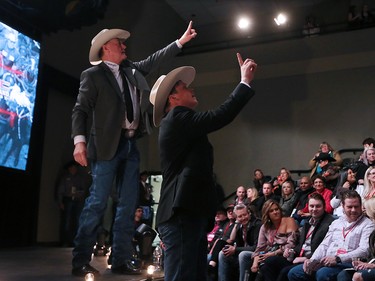 Auctioneers takes bids during the GMC Rangeland Derby canvas auction at Stampede Park on Thursday March 22, 2018. 
Gavin Young/Postmedia