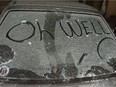 Spring was less than a week away when a record-breaking March snowstorm in 1998 paralyzed Calgary and led to the cancellation of many St. Paddy Day celebrations. Pictured here, someone scrawled a message on a Herald photographer's car, after it got stuck in an alley.