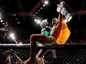 Conor McGregor celebrates his KO victory over Eddie Alvarez in their lightweight championship bout during UFC 205 at Madison Square Garden on November 12, 2016 in New York City. (Michael Reaves/Getty Images )
