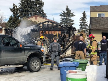 Police and fire crews on the scene of a garage fire in Abbeydale where a police officer was shot on Tuesday, March 17, 2018. The officer is reportedly in stable condition. The suspected shooter was found dead.