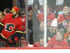 Flames goalie Mike Smith watches the end of the game after he was pulled at the start of third period during NHL action between the Anaheim Ducks and the Calgary Flames on Wednesday, March 21, 2018 in Calgary at the Saddledome. Flames lost 4-0.