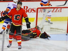 The Calgary Flames' Dougie Hamilton reacts after giving up a goal to the New York Islanders during NHL hockey at the Scotiabank Saddledome in Calgary on Sunday, March 11, 2018.