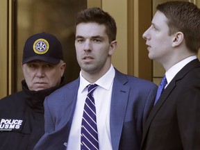 Billy McFarland, the promoter of the failed Fyre Festival in the Bahamas, leaves federal court after pleading guilty to wire fraud charges, Tuesday, March 6, 2018, in New York. (AP Photo/Mark Lennihan)