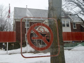 A no smoking sign is seen in front of City Hall Wednesday, March 7, 2018 in Hampstead, Que. Describing second-hand tobacco smoke as a danger, especially to minors, the elderly and those with lung diseases, the town of Hampstead has tabled a bylaw that will ban smoking on city property -- including streets and sidewalks. THE CANADIAN PRESS/Ryan Remiorz
