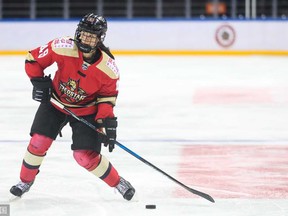 Kunlun Red Star's Jessica Wong positions herself for a shot on net. Wong is a Cochrane resident who has also spent time playing with the Calgary Inferno.