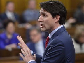 Prime Minister Justin Trudeau stands during question period in the House of Commons on Parliament Hill in Ottawa on Monday, March 26, 2018.