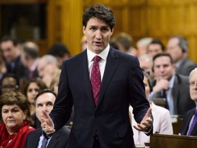 Prime Minister Justin Trudeau stands during question period on Parliament Hill in Ottawa on Wednesday, Feb. 28, 2018.