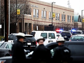 Deputies and federal agents converge on Great Mills High School, the scene of a shooting, Tuesday morning, March 20, 2018 in Great Mills, Md. (AP)