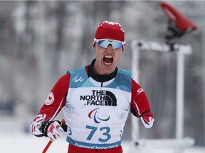 Mark Arendz celebrates victory in the Biathlon Standing Men's 15km at the 2018 Paralympic Winter Games at the Alpensia Biathlon Centre in Pyeongchang, South Korea, Friday, March 16, 2018.