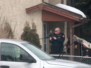 Calgary police respond to a shooting in the northeast community of Abbeydale which injured an officer on Tuesday, March 27, 2018.