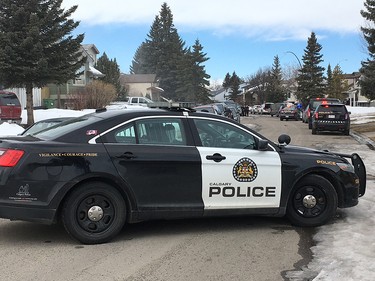Calgary police on Abingdon Way in northeast Calgary where an officer was shot on Tuesday, March 27.