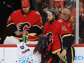 Flames goalies Mike Smith (at right) and backup goaltender David Rittich.
