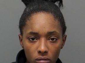 This undated provided by the Wake County, N.C, Detention Center, shows Brianna Ashanti Lofton, who is accused of allowing her baby to smoke a small cigar in a video that went viral. Police said on Wednesday, March 21, 2018, that Lofton, 20, was charged with marijuana possession and child abuse. (Wake County Detention Center via AP)