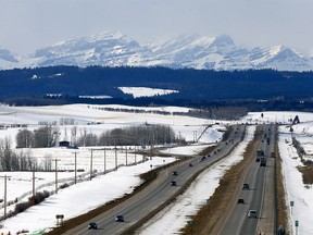 The snow pack mountains as seen west of Calgary as the spring thaw begins on Wednesday March 21, 2018. Darren Makowichuk/Postmedia