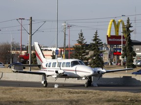 A small plane made an emergency landing on 36 Street N.E. in Calgary on Wednesday April 25, 2018. Leah Hennel/Postmedia