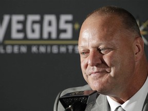 Gerard Gallant listens during a news conference Thursday, April 13, 2017, in Las Vegas. The Vegas Golden Knights have hired Gallant as the first coach of the NHL expansion team. (AP Photo/John Locher) ORG XMIT: NVJL103
