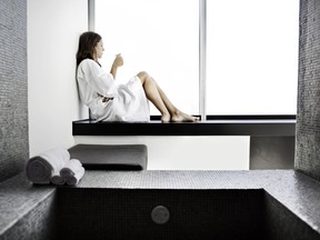 Woman in bathroom of a hotel