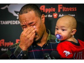 Deron Mayo with his daughter Maliya, the linebacker retired from the Calgary Stampeders after six seasons with the team. Al Charest/Postmedia